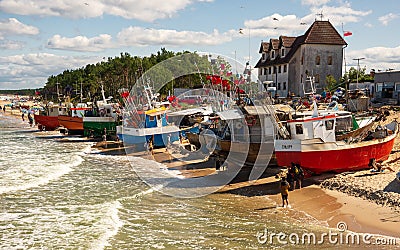 Fishing boats on the Baltic beach in ChÅ‚opy(West Pomeranian Voivodeship Editorial Stock Photo